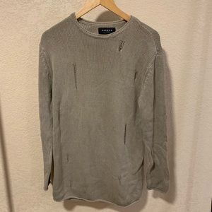 Distressed knit sweater